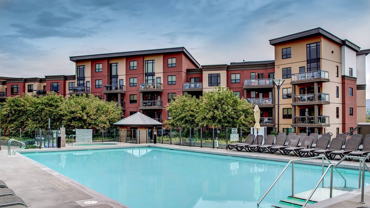 South Pandosy Condo | Poolside Mezzanine Penthouse with View