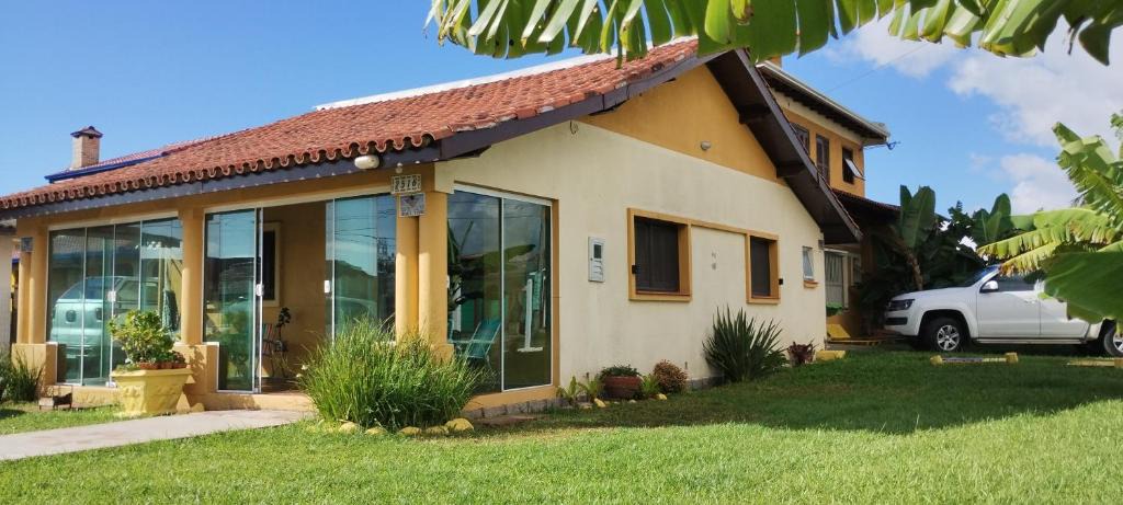 Tramandai House | Pousada Atlântica stay home
