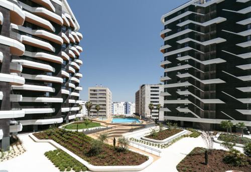 Parque das Nacoes Apartment | Premium Flat w/Balcony & Pool by HostWise