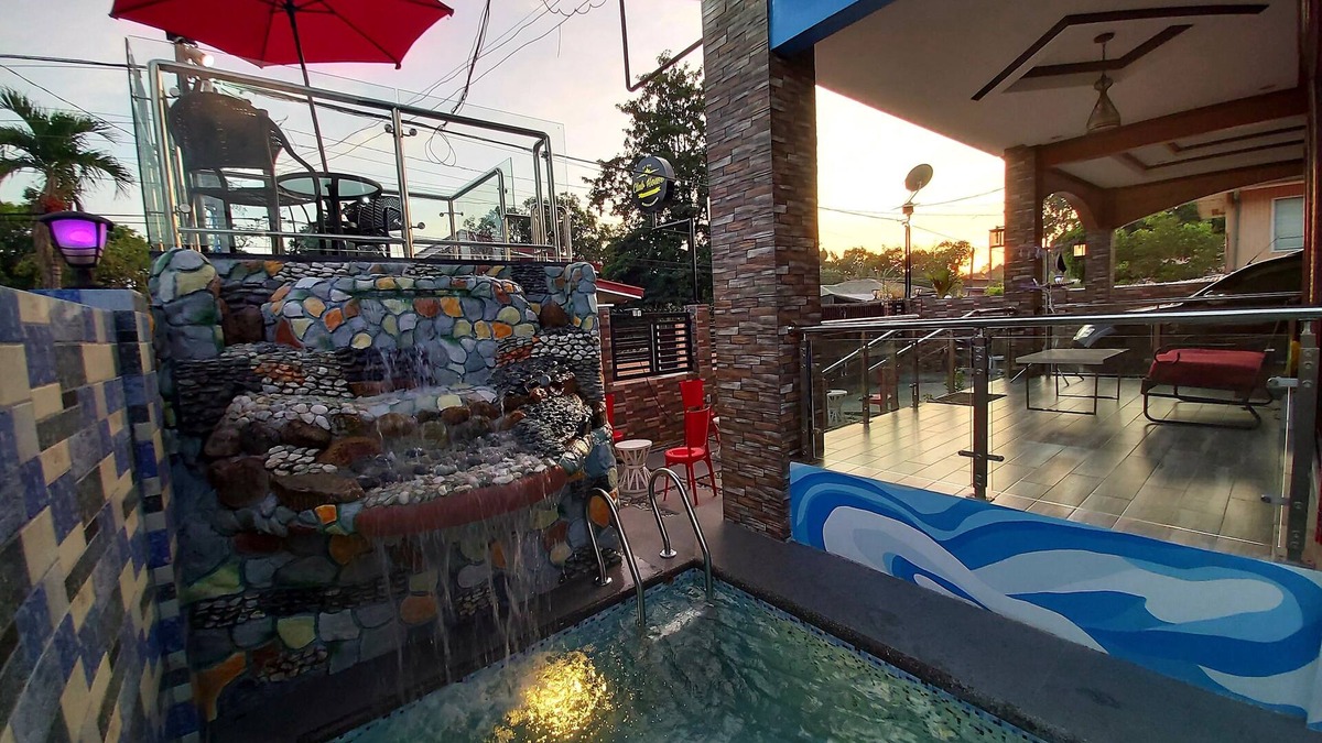 San Narciso House | Prestige Grounds Guesthouse with Lap Pool and Billiards