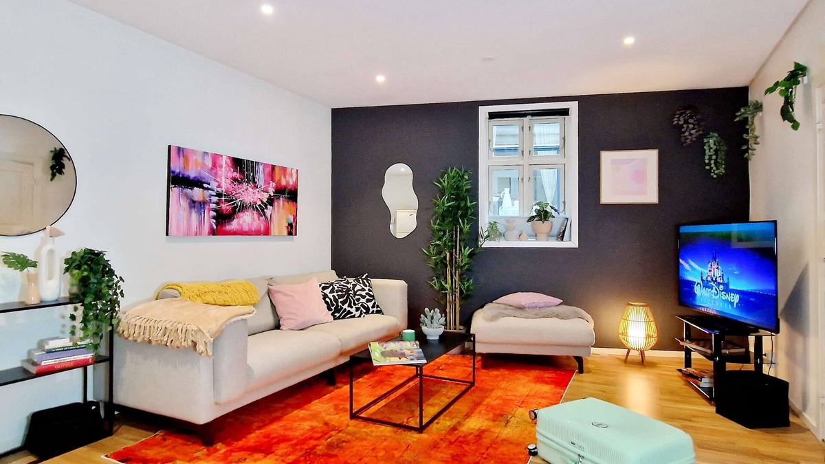 Engen Apartment | Prime location, amazing king bed, colorful oasis