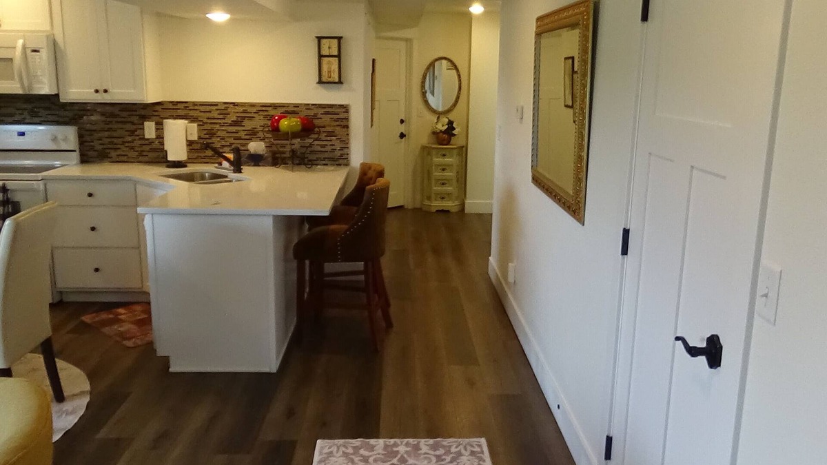 Loveland House | Private, beautiful one-bedroom basement apartment, with walkout and amenities!