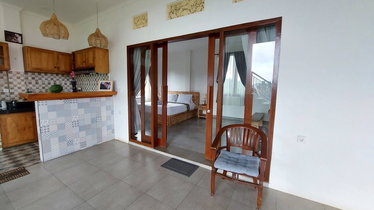 Melayang House | Private cozy bedroom with a spacious shared deck and spectacular view