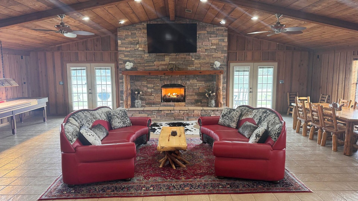Panola County Cabin | Private Lake Lodge on 104 acres with bar, pool table, shuffle board and more!