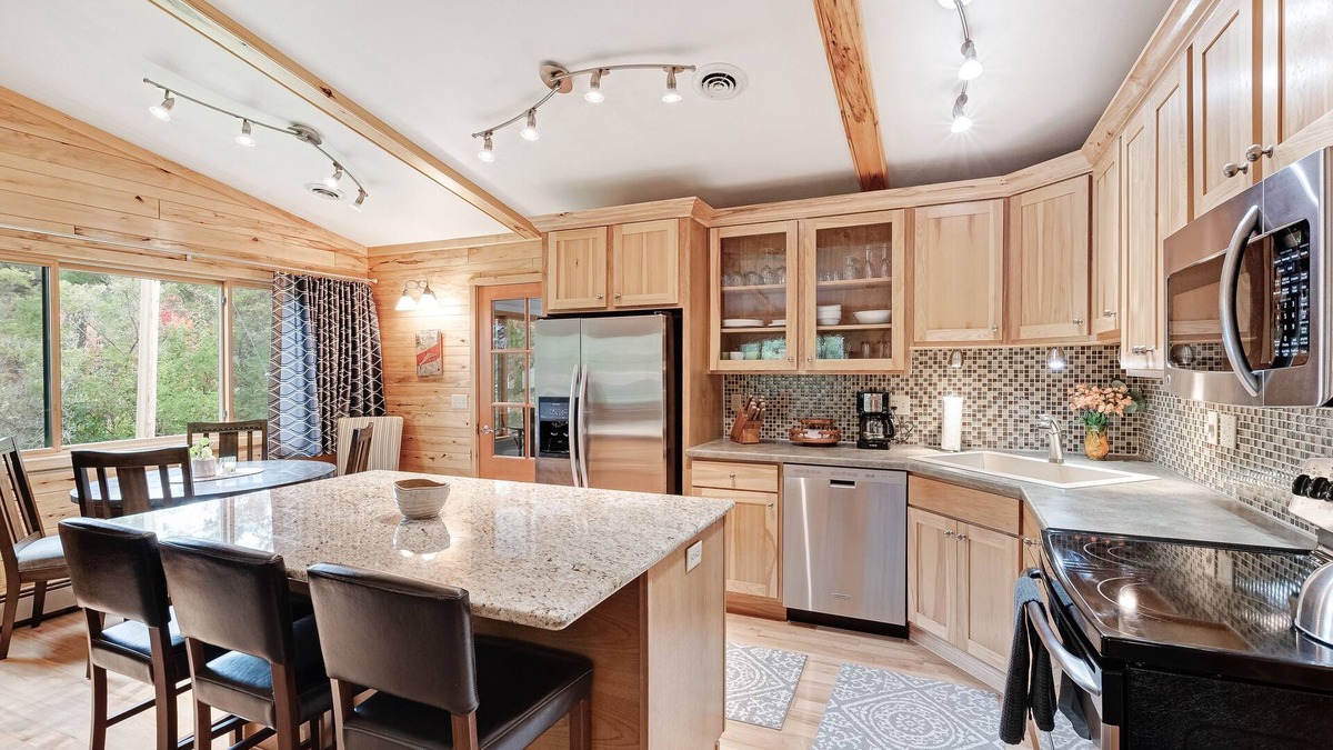 Manitowish Waters House | Private lakefront home with boat dock, fireplace, & generous yard