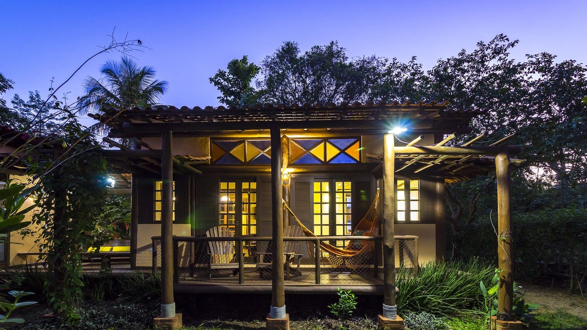 Paraty Apartment | Property with a small boat pier that makes island tours.