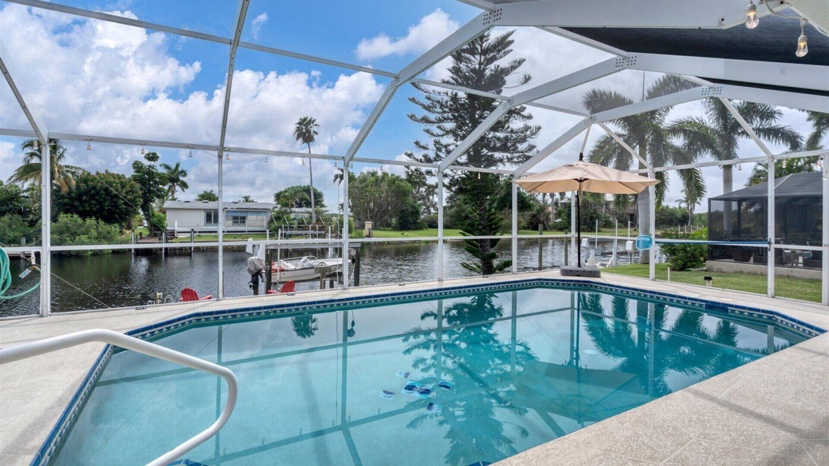Punta Gorda House | Punta Gorda 3-Bedroom Canalfront Pool Vacation Home with Dock