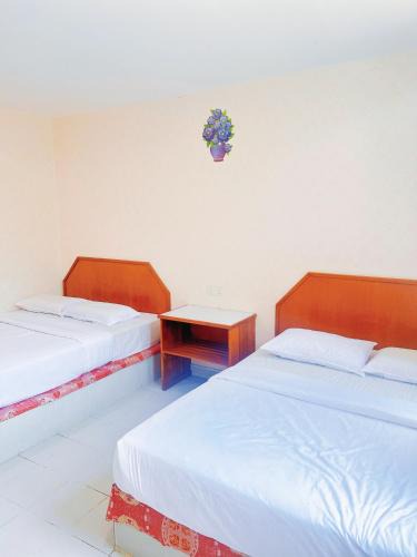 Bukit Kecil House | Quadruple Room with private bathroom