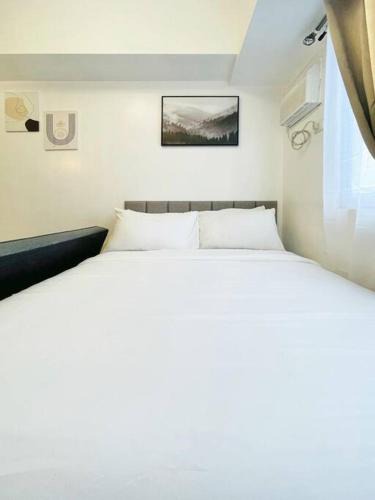 Mandurriao Apartment | R2 Minimalist Snug Haven