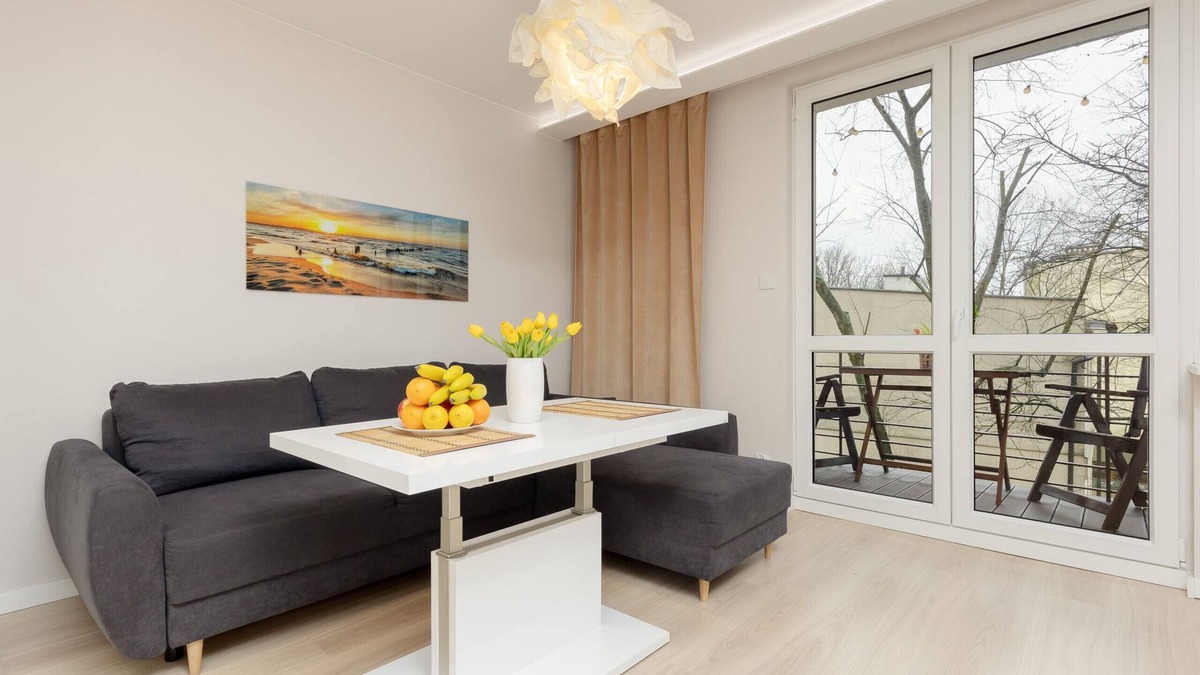 Baluty Apartment | Rajska 13 | Balcony and bedroom | Łódź