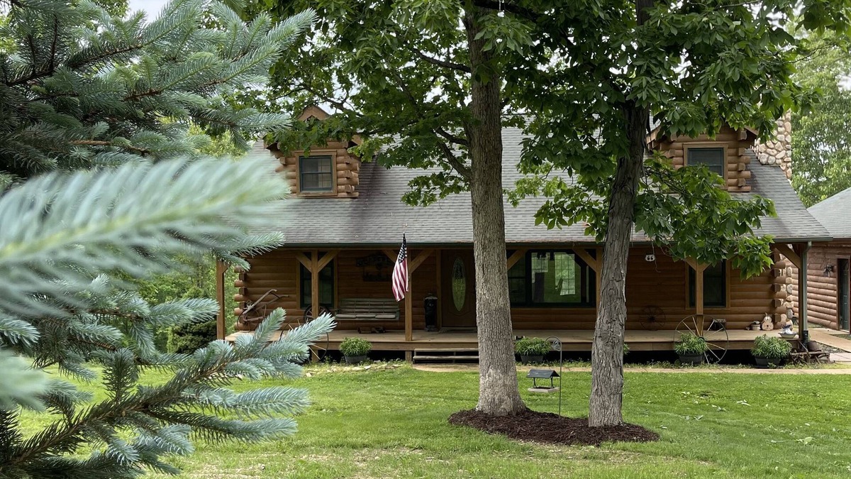 Bourbon Cabin | Real Log Cabin with Seasonal Pool and Hot Tub near Blue Springs Ranch
