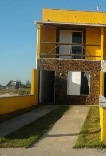 Jaguaruna House | Recanto das Pedras - Casa Pedra Ferrugem Com vista para o mar