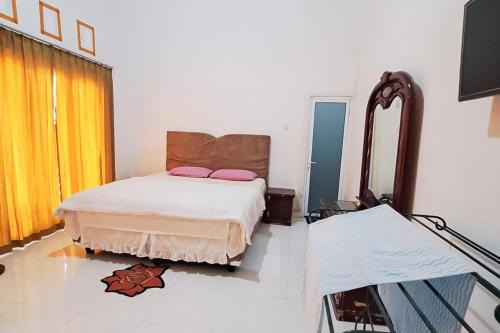 Mogolaing Hotel | RedDoorz at Family Syariah Homestay kotamobagu