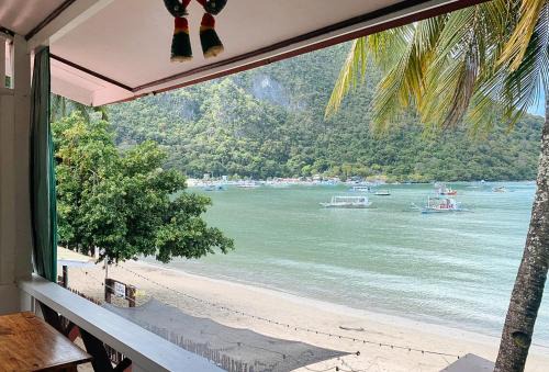 El Nido Hotel | RedDoorz @ Tandikan Beach Cottages