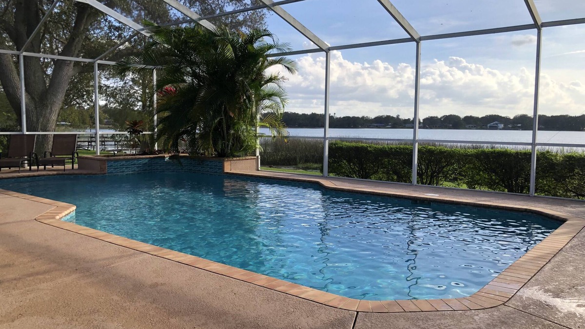 Auburndale House | Relax at Southern Exposure in Auburndale with a Pool & 76 Acre Private Lake.