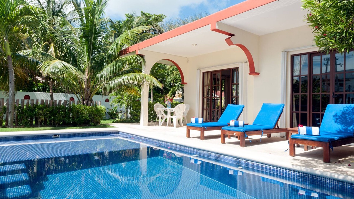 Puerto Morelos House | Relax by the sparkling pool and enjoy the ocean breeze.