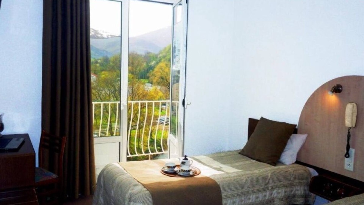 Lourdes Hotel | Relax in Comfort, Pet-Friendly, Free Parking, Onsite Restaurant, Scenic Views!