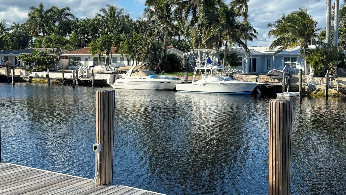 Harbor Village Condo | Relax & Unwind – Walk to the Beach from This 2BR -2BA with Pool and fishing dock
