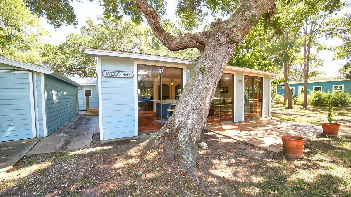 Cedar Lane House | Relaxing Caney Creek views or just minutes from the beach!