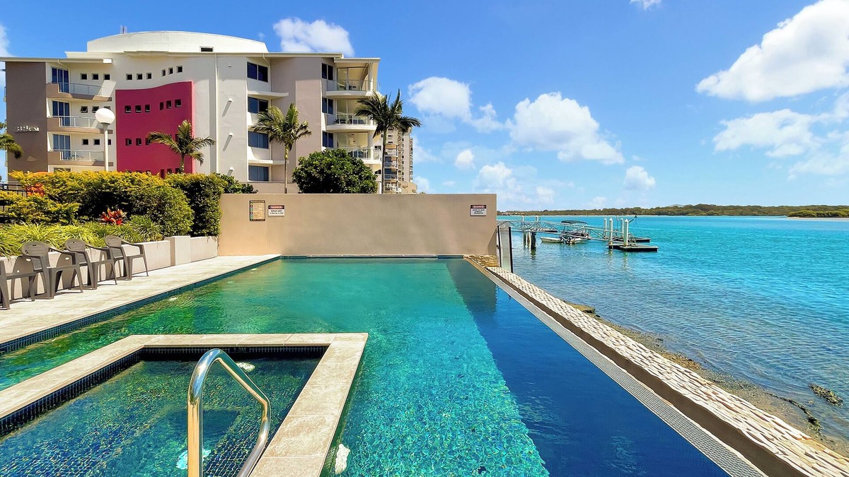 Maroochydore Apartment | Relaxing Escape: Pool, Tennis Court, Garden Terrace & Water Views