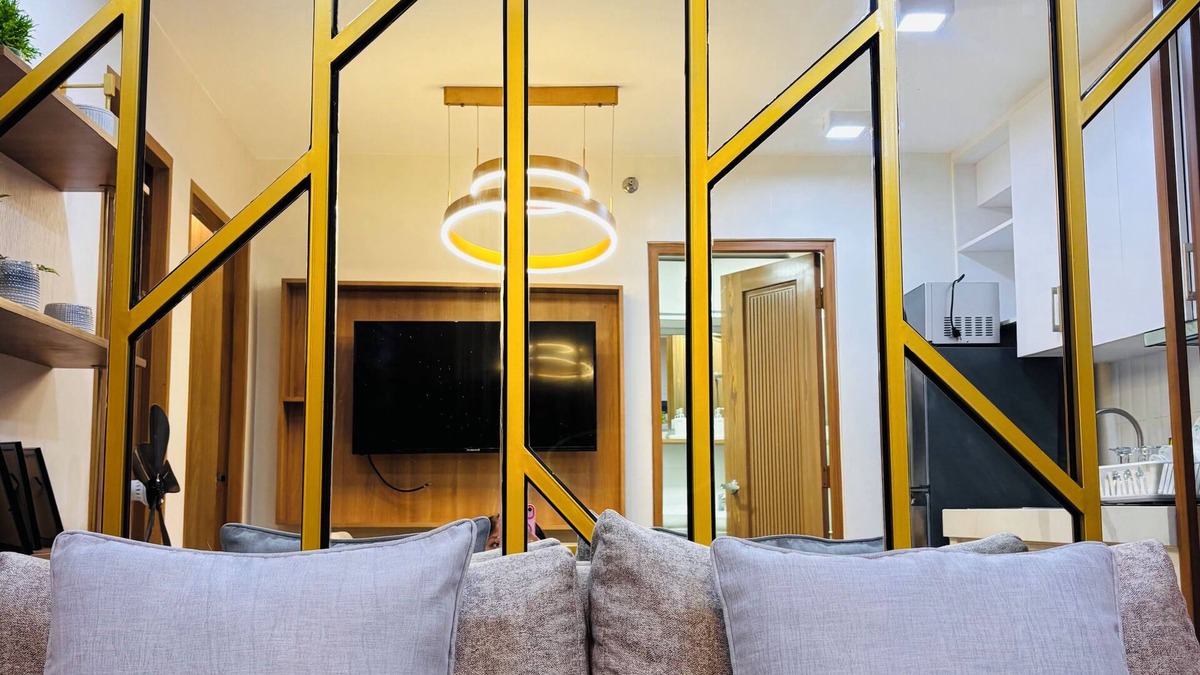 Mandurriao Condo | Relaxing Escape with Spacious Sofa Corner