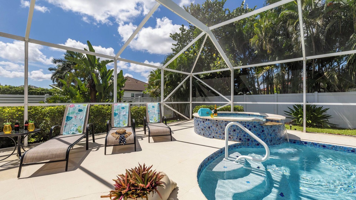Pelican House | Relaxing outdoor with pool and hot tub!