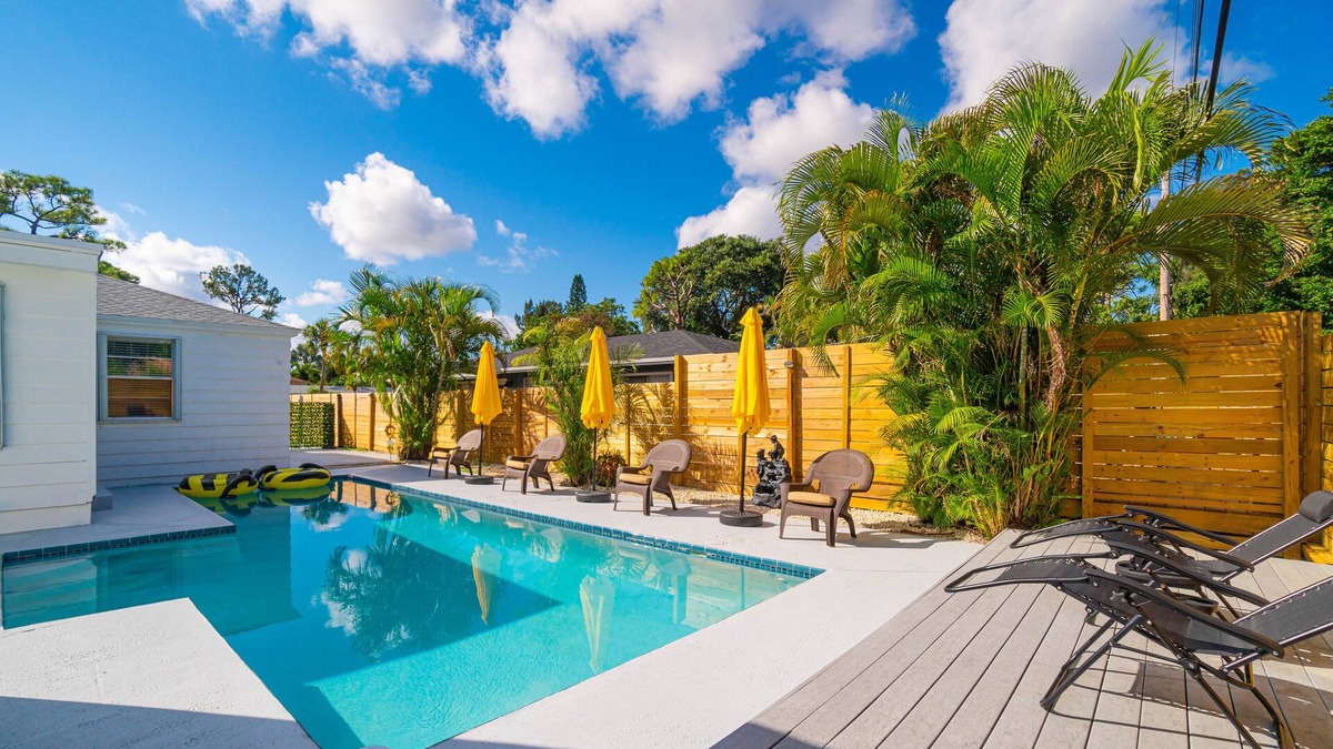 Delray Beach House | Remodeled HEATED pool house, 8 minutes to the beach! Honey Hole theme