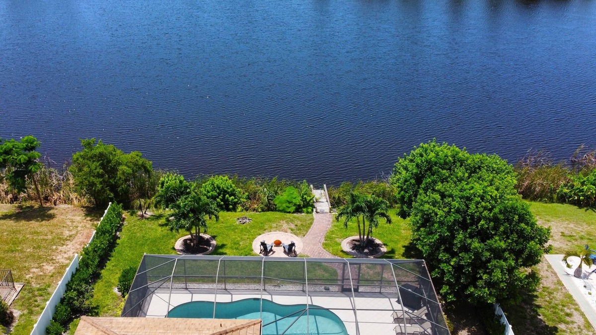 Bonita Springs House | Remodeled Lakefront Pool Home, Privacy, screened Lanai, Bicycles, close to Beach