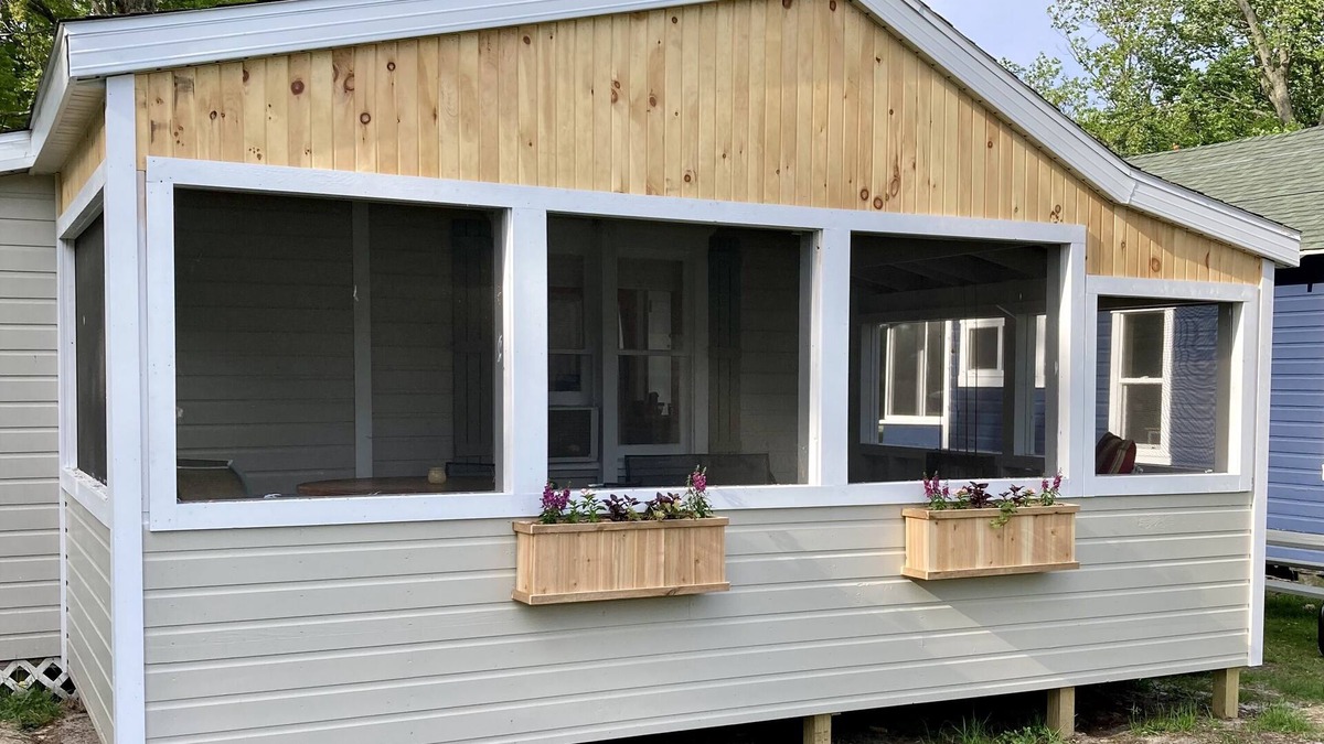 Ludington Cottage | Remodeled lakefront cottage w/marina, firepit, swimming area.
