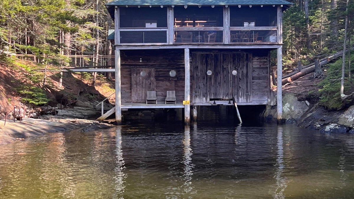 West Point Cabin | Renovated 3-BR boathouse built atop water in quiet cove; private float & trails