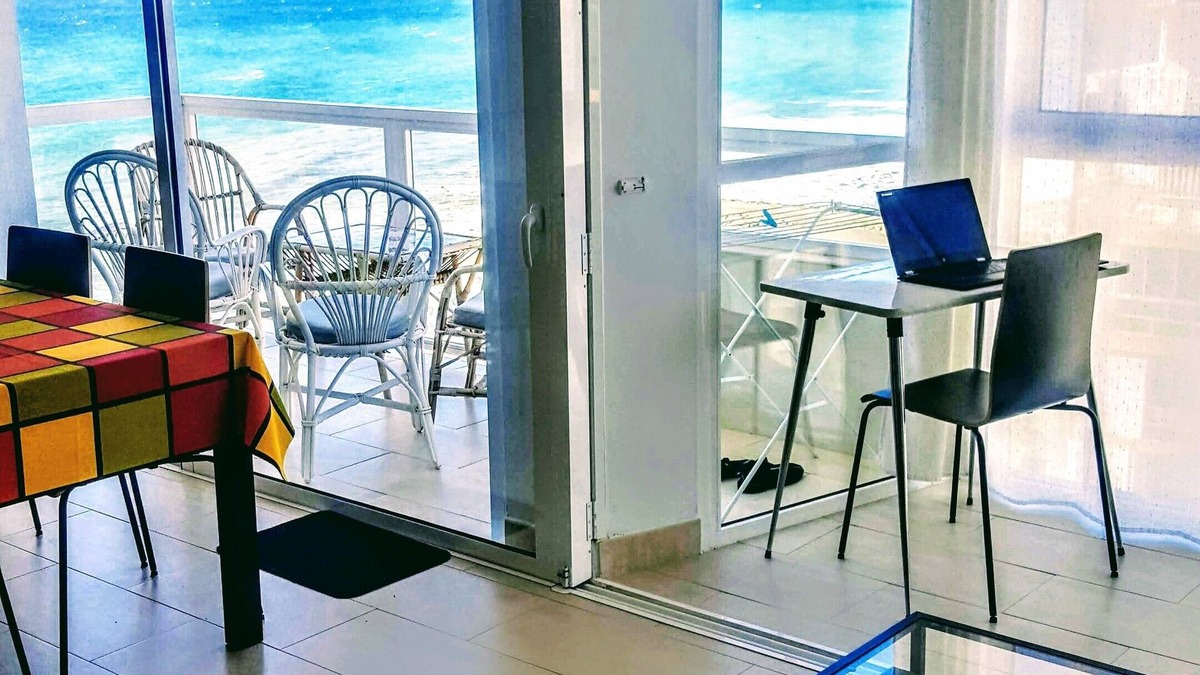 Algarrobo Apartment | Renovated fantastic beachfront apartment. Sleeps 4, pool and children pool, tenn