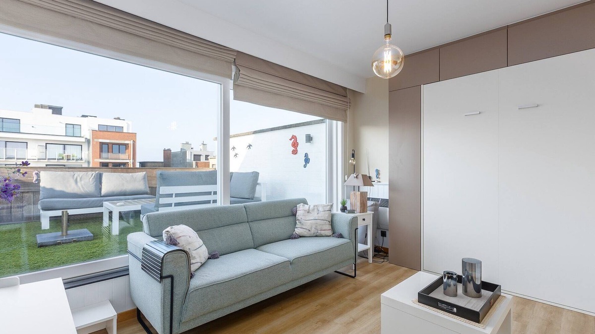 Middelkerke Apartment | Renovated studio with roof terrace near the sea.