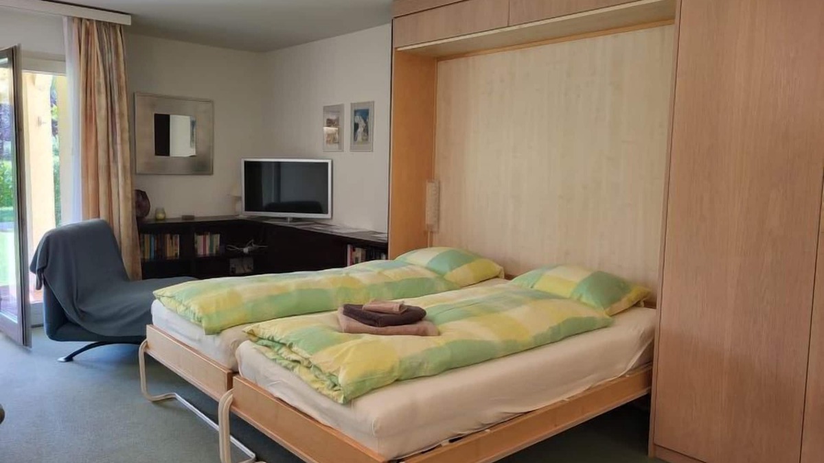 Caslano Apartment | Residenza Parcolago Apt 018 mit Garten by Interhome