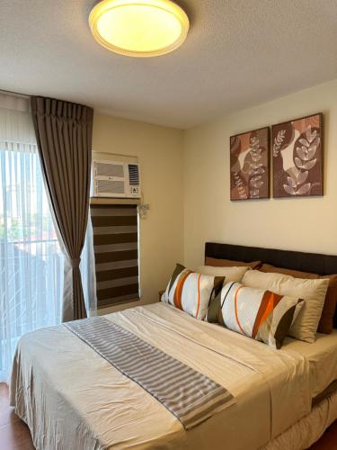 Cebu Apartment | Resort-inspired Condo with Queen-size bed & 50-inch Smart TV