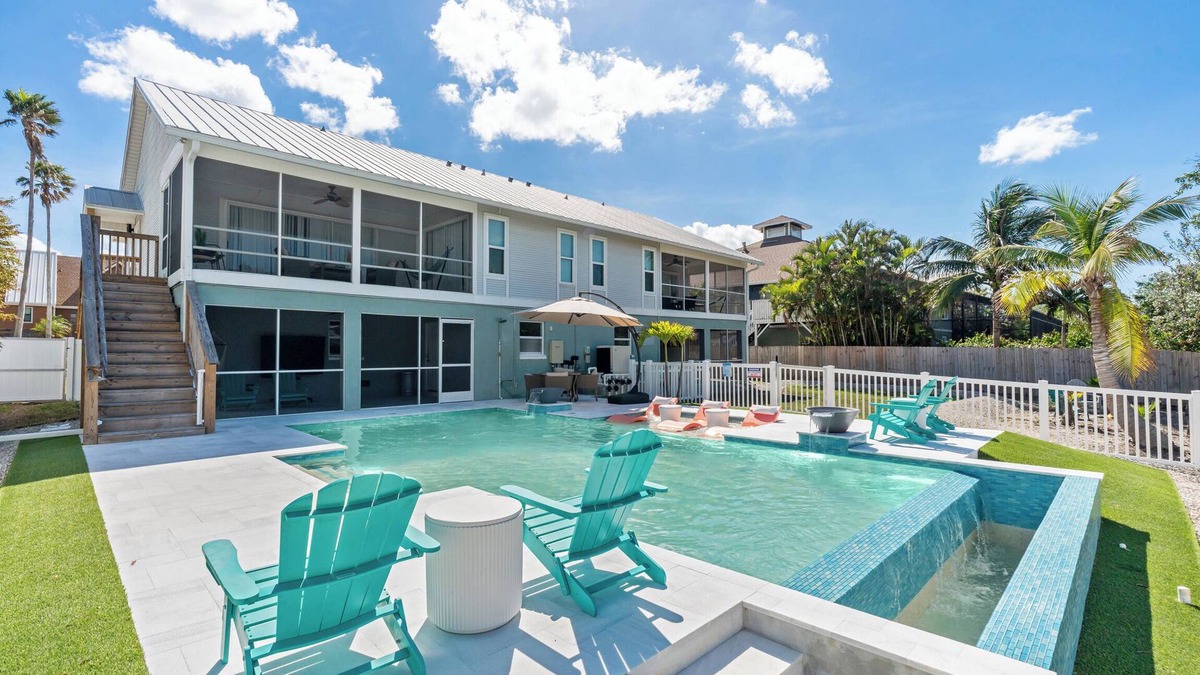 Mid Island House | Resort Oasis 4-bed/4.5 bath + Pool + Boat & Jet Ski Lifts, Game Room + Gym!