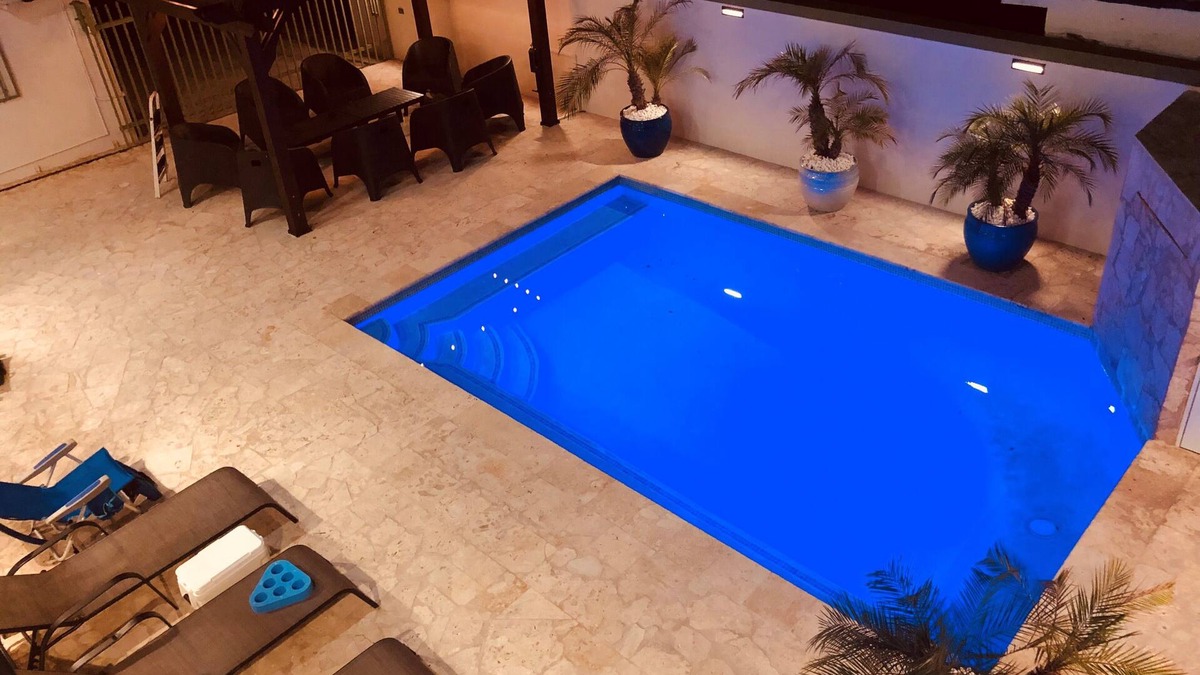 Rincon House | Rincon's 5 star Luxury Adult Only Villa Steps from beach, shops and dinning.