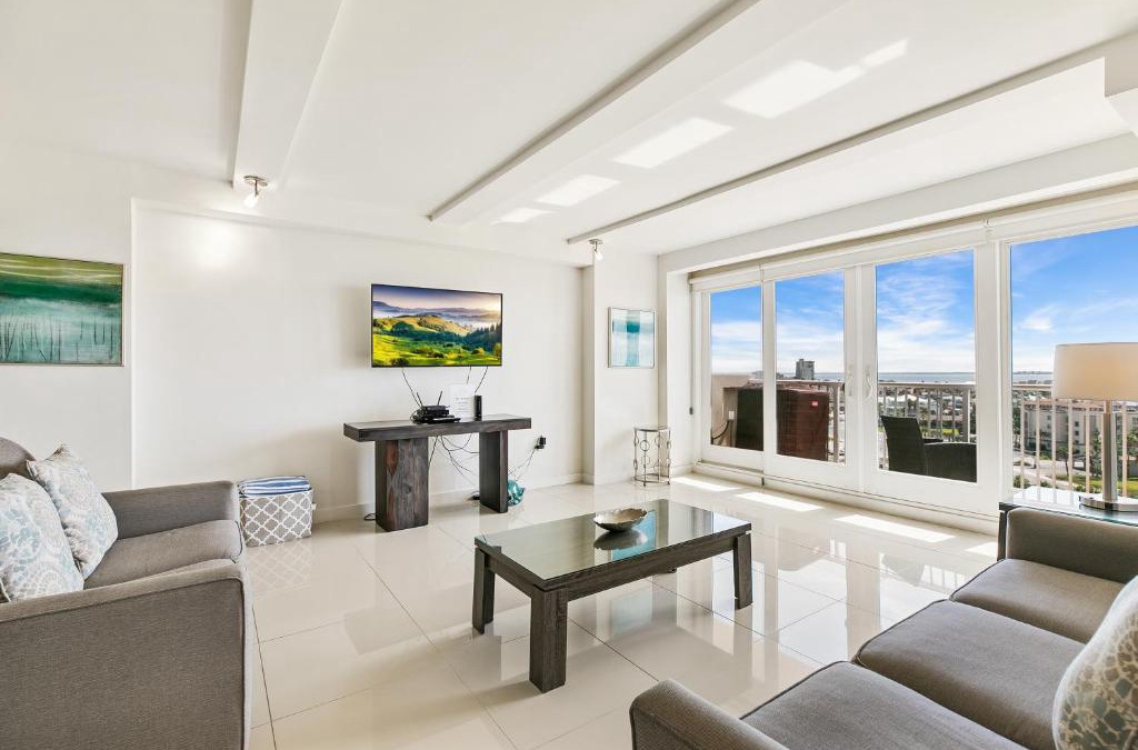 South Padre Island House | Rise & shine in paradise! Stylish Bayview condo beachfront resort shared pools &jacuzzi