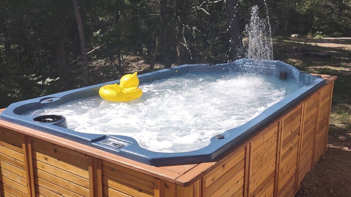 Crystal Falls Cabin | RIVER RENTAL NEW LOG CABIN-POOL SPA ON THE PAINT RIVER-DOCK-CANOES FISH GOLF ORV