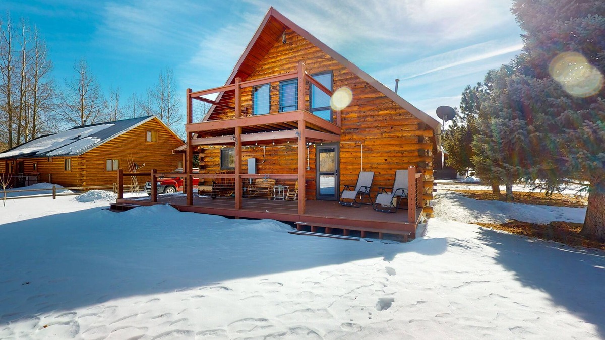 Rivers Edge House | Riverfront home with river & valley views, wood stove, deck, & W/D