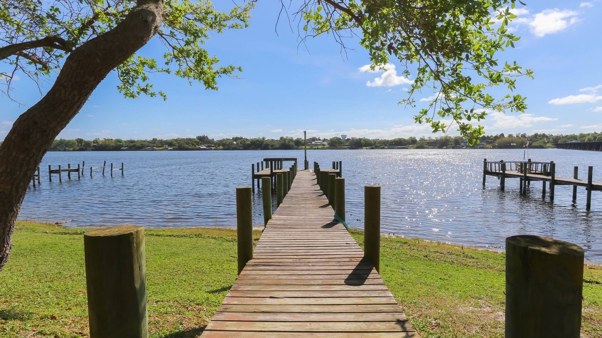 Roseland House | Riverfront Retreat, Private Docks, on Small Acreage.