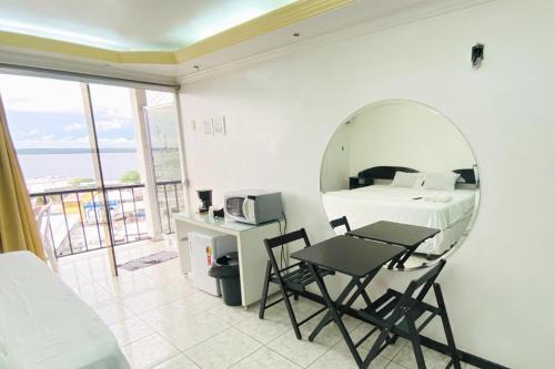 Centro Apartment | Riverfront Retreat Prime Location Apartment with Stunning Views of the RioNegro