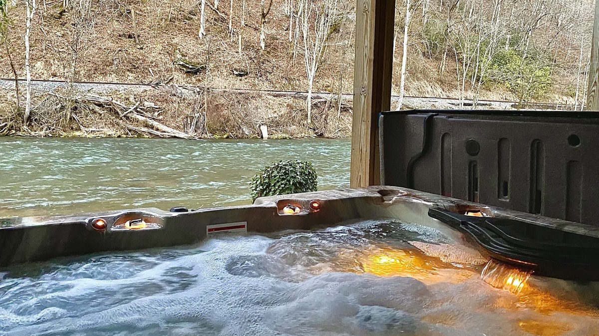 Bryson City Cabin | RIVERFRONT Retreat with HOT TUB on Nantahala River