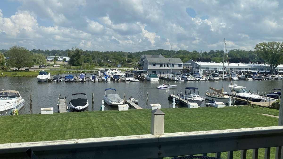South Haven Condo | Riverfront Retreat! Walk to Downtown/Near Beaches!