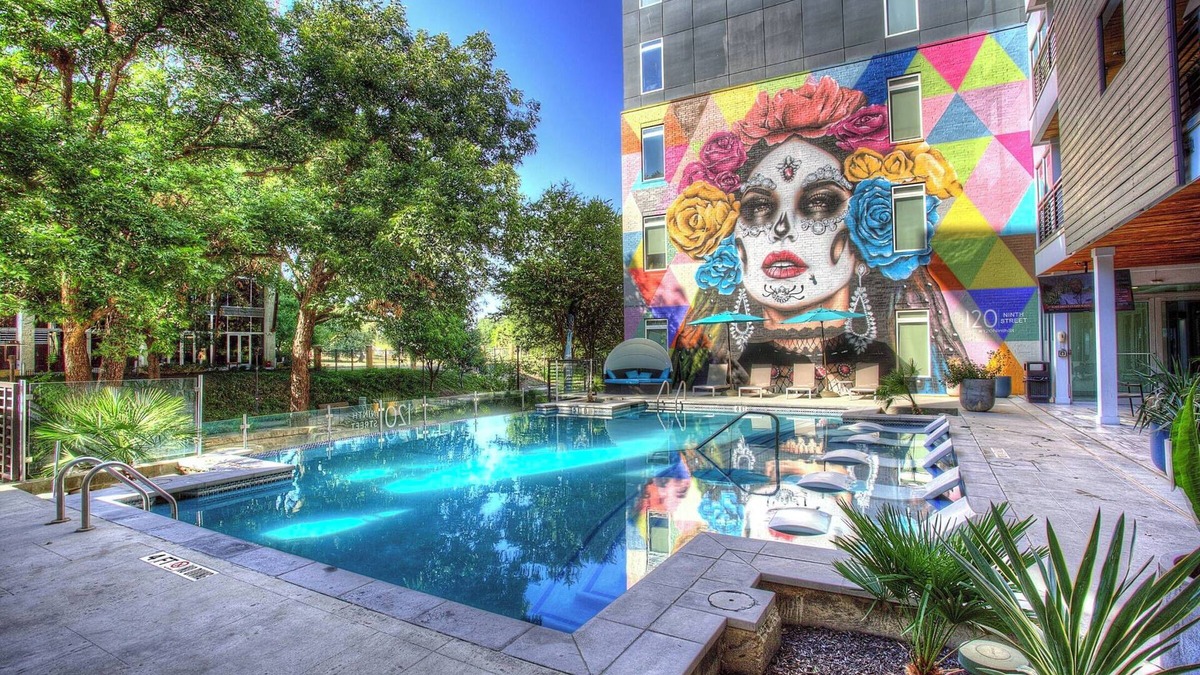 Downtown San Antonio Apartment | Riverwalk King Suite Apt Retreat with infinity pool Sofa Bed Gym & Free Parking