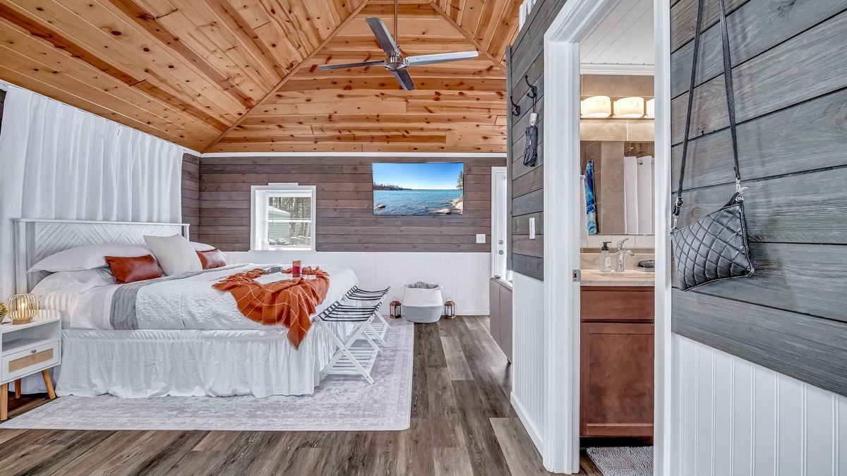 Montague Cottage | Romantic cottage, Lake MI access, wi-fi, king bed, solo stove, sunset views