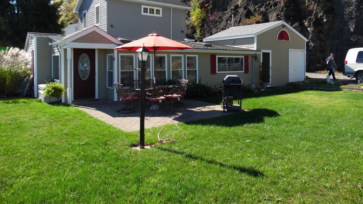 Valois Cottage | Romantic home on level Seneca Lake Front.