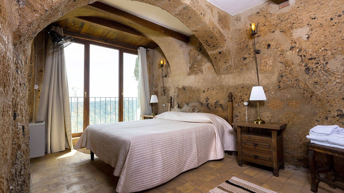 Civita di Bagnoregio Apartment | Romantic home carved into the rock with breathtaking views