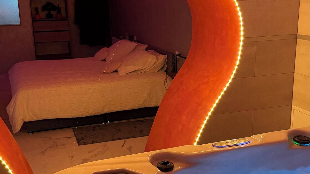 Luxeuil-les-Bains Apartment | Romantic loft in the heart of Luxeuil's historic town center with jacuzzi.