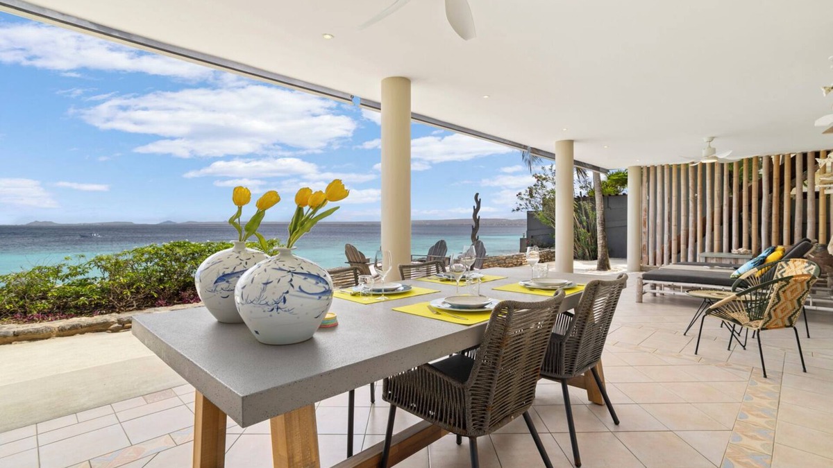 Belnem House | Romantic oceanfront studio in Bonaire with private porch and sea views. Perfect for couples seeking peace, privacy, and tropical charm.