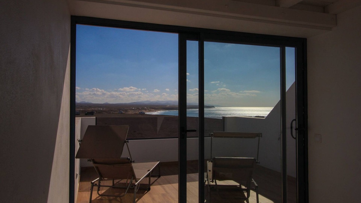 El Cotillo Condo | Romantic Penthouse , breathtaking ocean views, beachfront